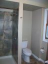 All tile shower and floor with cafe-au-lait paint color